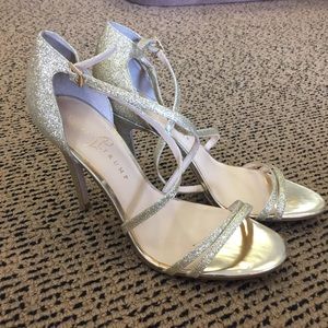 Ivanka Trump like new strappy gold heels with 4" heels.